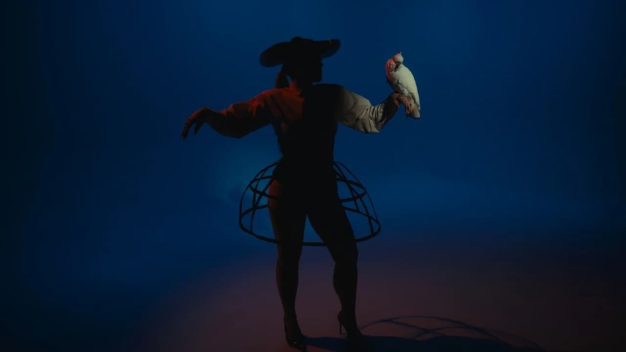 Still from the Puma June music video for Sampson featuring an exotic animal sharing the frame with the artist
